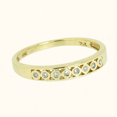 10K Gold Ladies 0.16 CTW 8 Diamond Band